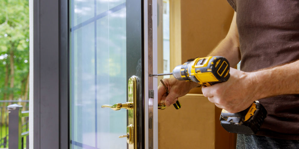 a man replacing doors 