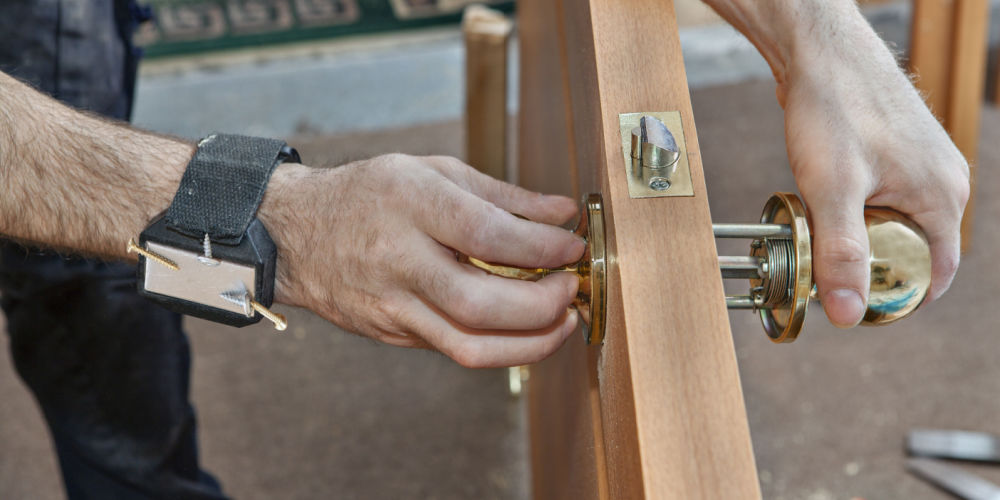 a man replacing doors 