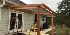 how to connect a porch roof to house